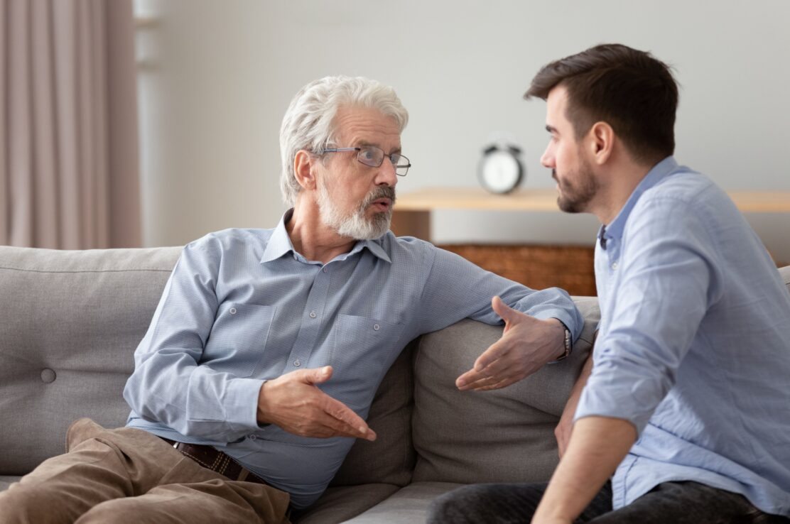 A father and son having a serious conversation