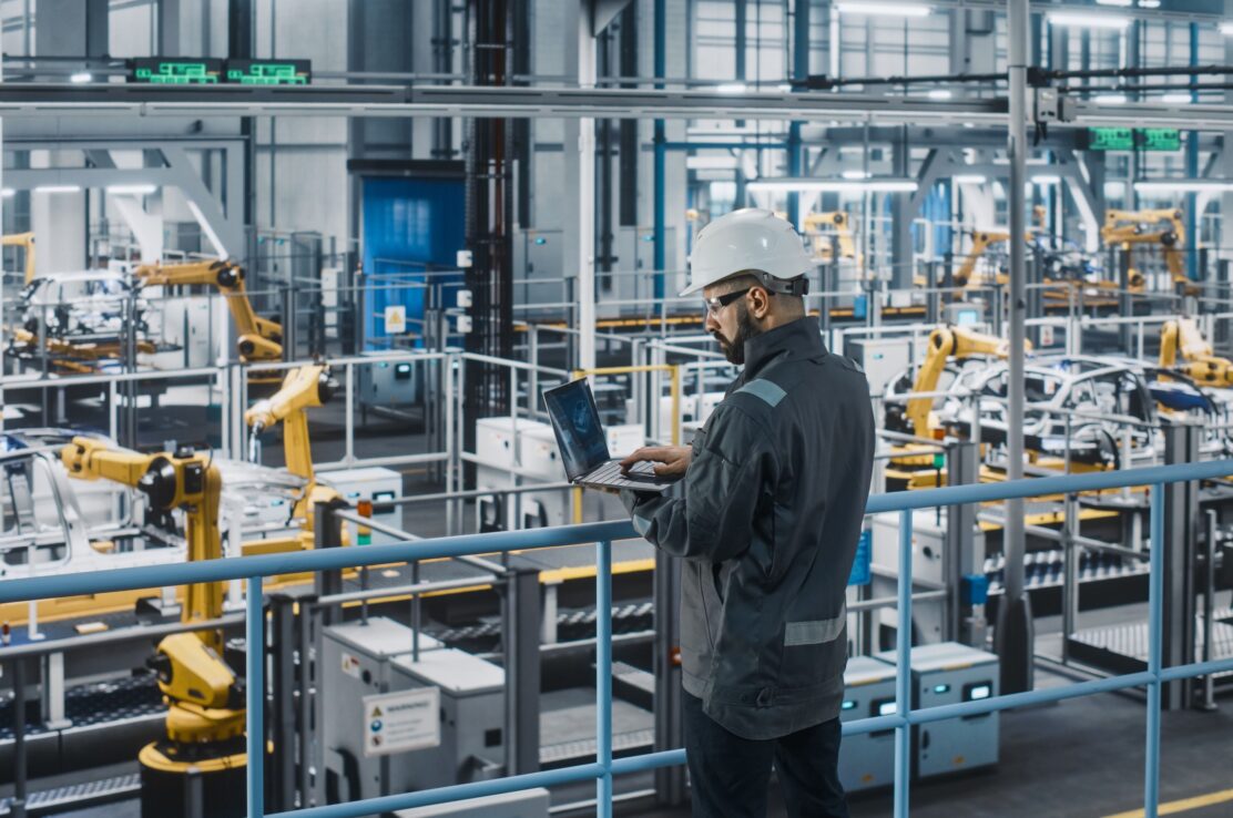 A worker in a car factory.