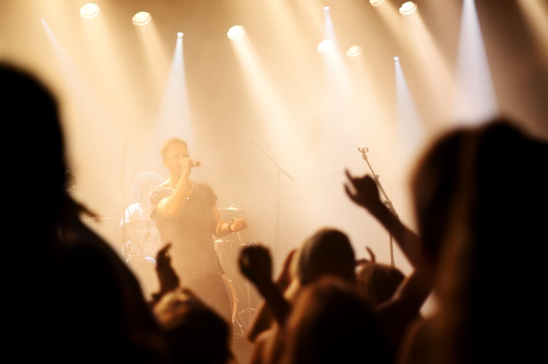 A band on stage at a gig.